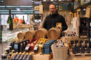 The A Modo Bio counter display at Mercato Albinelli in Modena