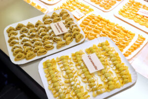 Detail of the Bottega della pasta stall, Mercato Albinelli in Modena