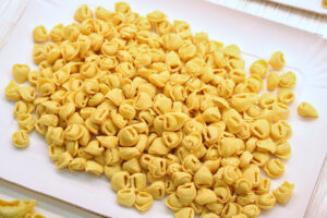The Bottega della pasta counter display at Mercato Albinelli in Modena