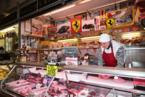 The Antica Salumeria della Galleria counter display at Mercato Albinelli in Modena