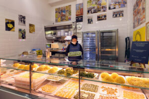 The Bottega della pasta counter display at Mercato Albinelli in Modena