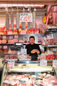 Salumeria Anselmo Bonini, Andrea Solieri, A. Facchini — deli and cured meats at Mercato Albinelli in Modena